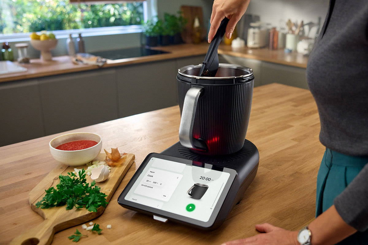 Thermomix TM7: L'appareil de cuisine ultime et silencieux.